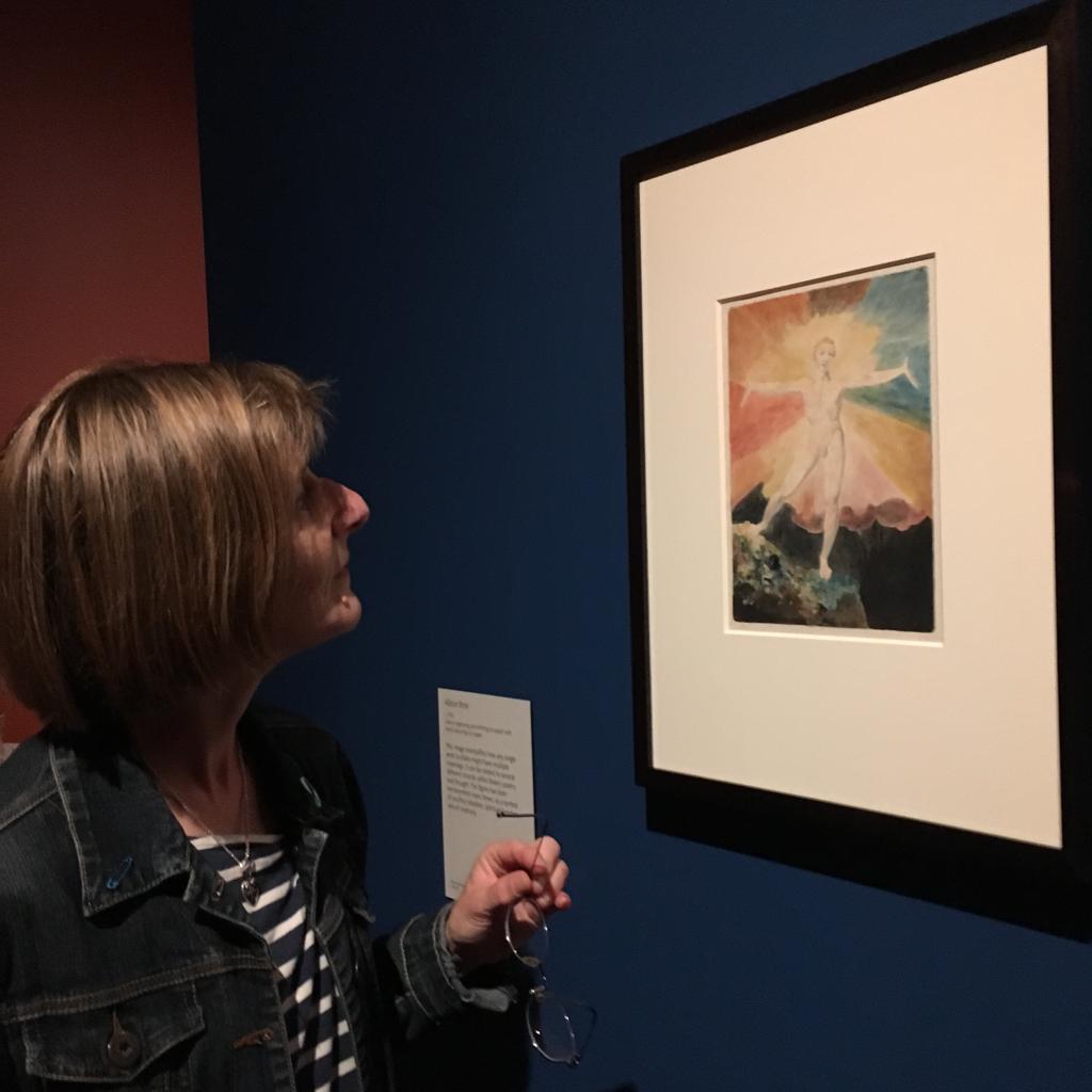 Anna looking at the William Blake image Albion Rose